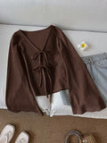 Front-Tie Bow Flared Sleeve Blouse